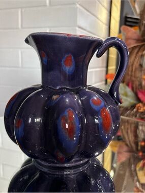 Handcrafted Deep Purple Ceramic Pitcher with Red & Blue Accents